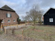 Zicht op de Antoniushoeve vanaf de weg